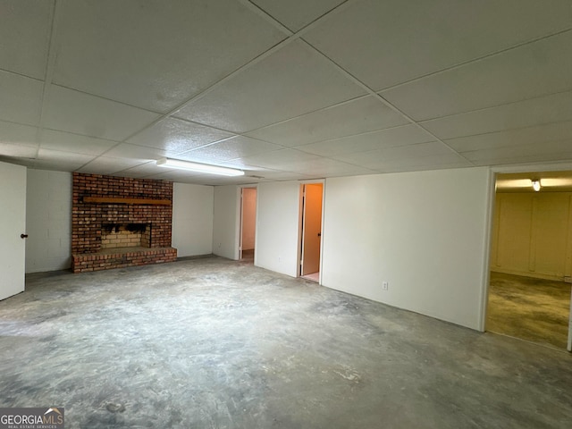 3340 Zingara Rd, Conyers, GA 30012 - finished below grade area featuring a brick fireplace and a paneled ceiling