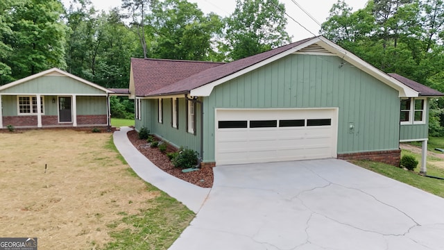 3340 Zingara Rd, Conyers, GA 30012 - ranch-style home featuring roof with shingles, a front yard, and a garage