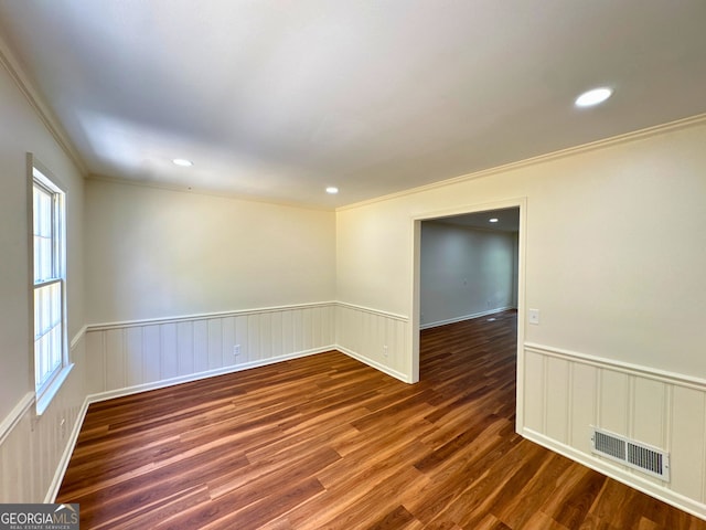 3340 Zingara Rd, Conyers, GA 30012 - empty room featuring ornamental molding, a wainscoted wall, wood finished floors, and recessed lighting