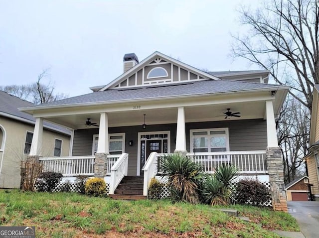 2132 Memorial Dr SE, Atlanta, GA 30317 - craftsman-style house with ceiling fan, covered porch, a chimney, and roof with shingles