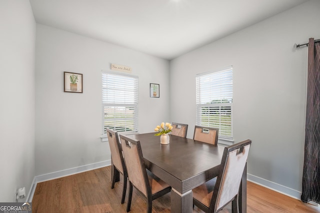 838 Maduro Way, Mcdonough, GA 30253 - dining area with light wood-style flooring and baseboards
