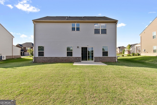 838 Maduro Way, Mcdonough, GA 30253 - back of house featuring a patio, a yard, brick siding, and a residential view