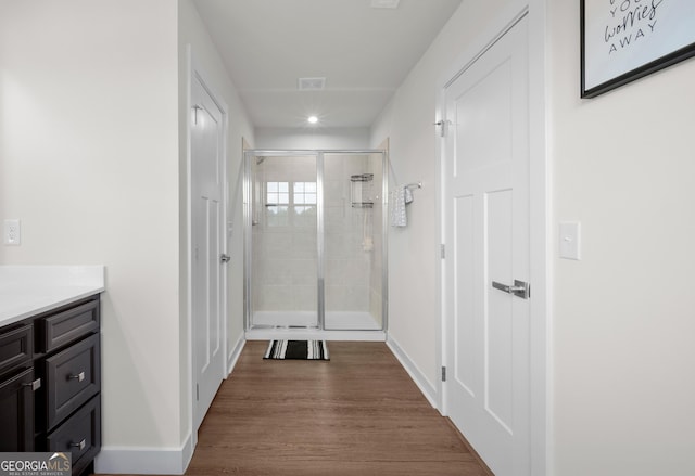 838 Maduro Way, Mcdonough, GA 30253 - hallway featuring dark wood finished floors, baseboards, and recessed lighting