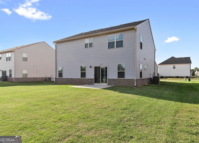 838 Maduro Way, Mcdonough, GA 30253 - back of property with a patio, a lawn, and central AC unit