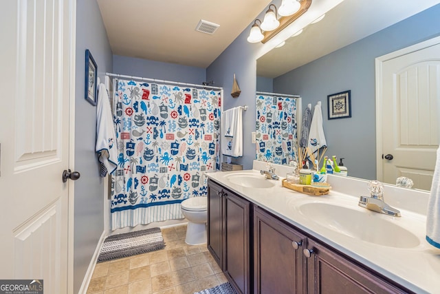 139 Village Park Dr, Newnan, GA 30265 - full bathroom featuring toilet, double vanity, baseboards, and a shower with shower curtain