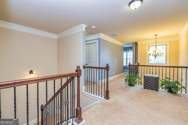 139 Village Park Dr, Newnan, GA 30265 - hall featuring an upstairs landing, a chandelier, crown molding, carpet, and baseboards