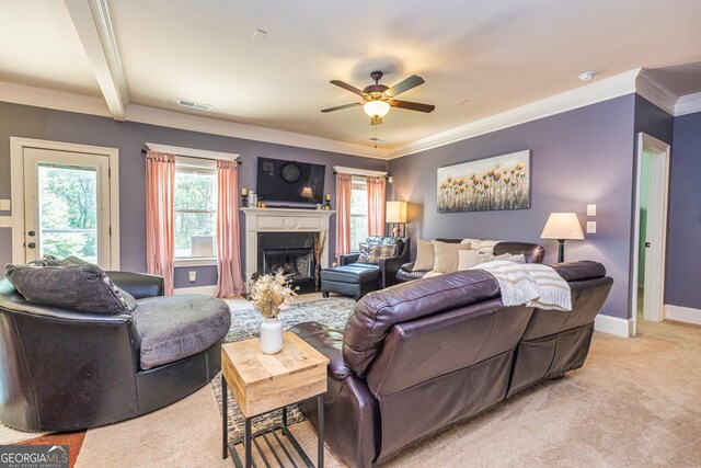 139 Village Park Dr, Newnan, GA 30265 - living area featuring light carpet, a ceiling fan, plenty of natural light, a fireplace, and ornamental molding
