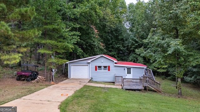 detached garage with concrete driveway