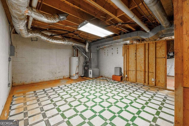 unfinished below grade area with gas water heater and heating unit