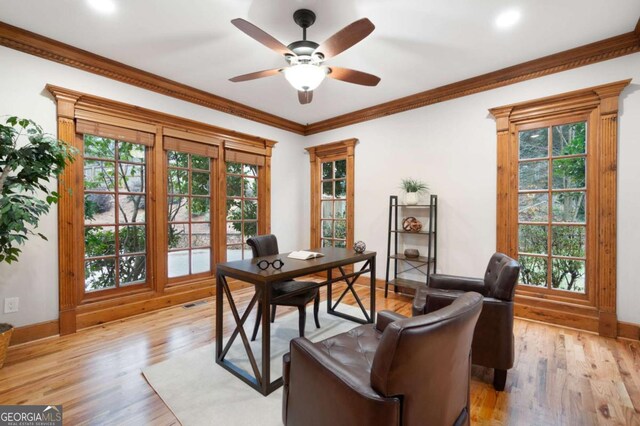 355 Clark Creek Pass, Acworth, GA 30102 - living area with arched walkways, ornamental molding, stairway, a ceiling fan, and recessed lighting