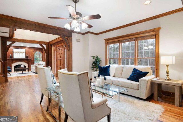 355 Clark Creek Pass, Acworth, GA 30102 - dining space featuring a chandelier, light wood finished floors, crown molding, french doors, and a fireplace