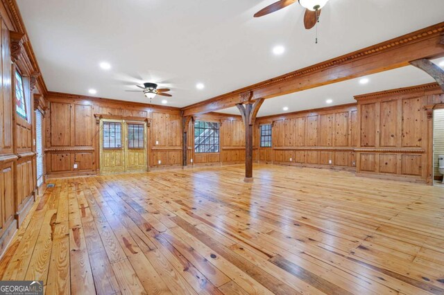 355 Clark Creek Pass, Acworth, GA 30102 - kitchen with a sink, light wood-style flooring, stainless steel double oven, wood walls, and wood counters