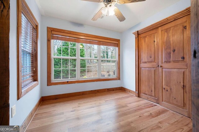 355 Clark Creek Pass, Acworth, GA 30102 - spare room with plenty of natural light, light wood-type flooring, and baseboards