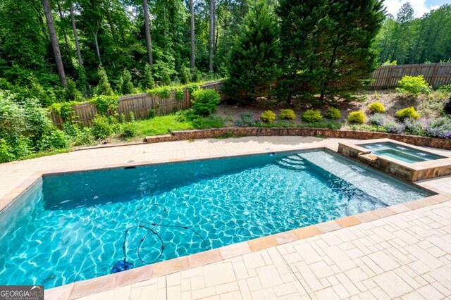 355 Clark Creek Pass, Acworth, GA 30102 - back of property featuring a sunroom, stone siding, and stairway