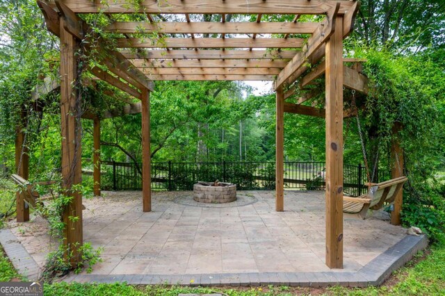 355 Clark Creek Pass, Acworth, GA 30102 - view of patio with an outdoor fire pit and a pergola