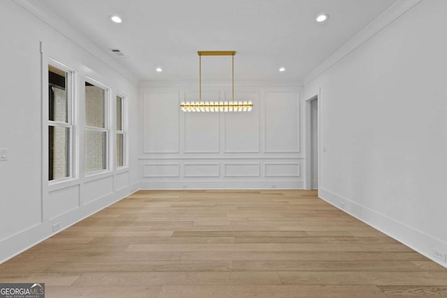 400 Auburn Rd, Auburn, GA 30011 - unfurnished dining area featuring light wood finished floors, recessed lighting, and a decorative wall