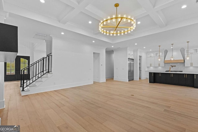 400 Auburn Rd, Auburn, GA 30011 - unfurnished living room featuring coffered ceiling, a chandelier, light wood-type flooring, baseboards, and recessed lighting