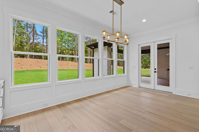 400 Auburn Rd, Auburn, GA 30011 - unfurnished sunroom featuring french doors and a chandelier
