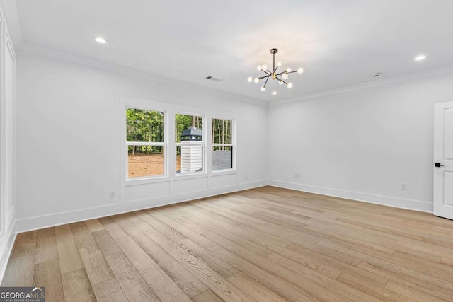 400 Auburn Rd, Auburn, GA 30011 - spare room featuring a chandelier, light wood-type flooring, ornamental molding, baseboards, and recessed lighting