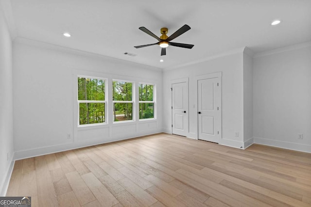 400 Auburn Rd, Auburn, GA 30011 - unfurnished bedroom featuring ornamental molding, light wood finished floors, baseboards, recessed lighting, and multiple closets