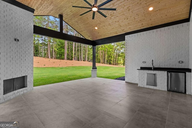 400 Auburn Rd, Auburn, GA 30011 - view of patio / terrace with a ceiling fan, exterior kitchen, and an outdoor brick fireplace