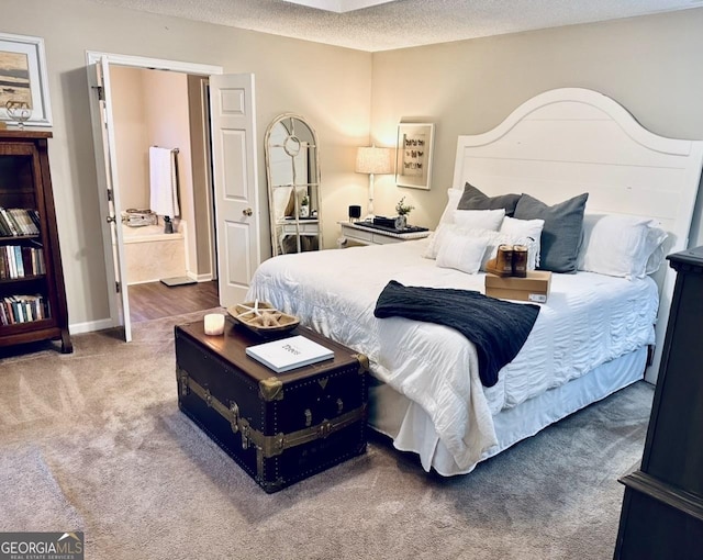 122 Wilson Cir, Carrollton, GA 30117 - carpeted bedroom with a textured ceiling and baseboards