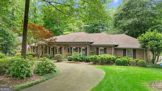 11190 Hembree Springs Dr, Roswell, GA 30076 - ranch-style home with brick siding, a front yard, and a shingled roof