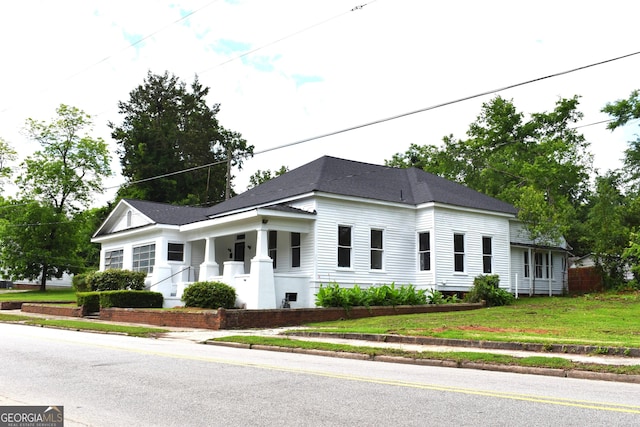 210 E Church St, Sandersville, GA 31082 - greek revival inspired property featuring a front lawn
