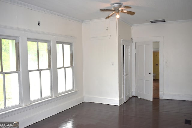 210 E Church St, Sandersville, GA 31082 - empty room with crown molding, baseboards, healthy amount of natural light, and ceiling fan