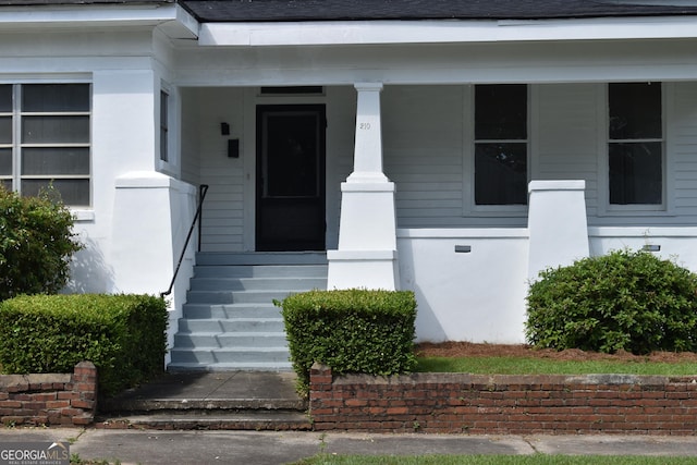 210 E Church St, Sandersville, GA 31082 - view of exterior entry with covered porch