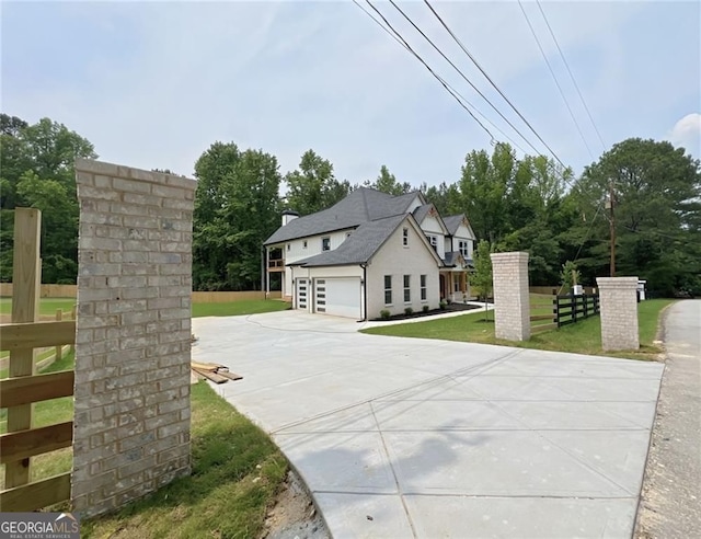 1461 Leach Dr, Lawrenceville, GA 30045 - view of front facade featuring a garage and driveway