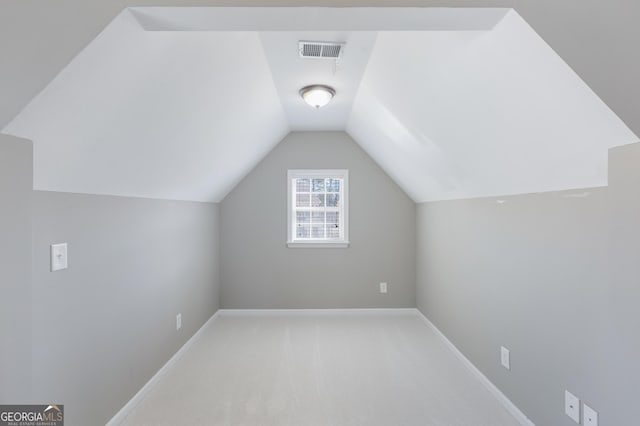 2430 Redbud Meadow Ln, Douglasville, GA 30135 - bonus room featuring carpet, vaulted ceiling, and baseboards