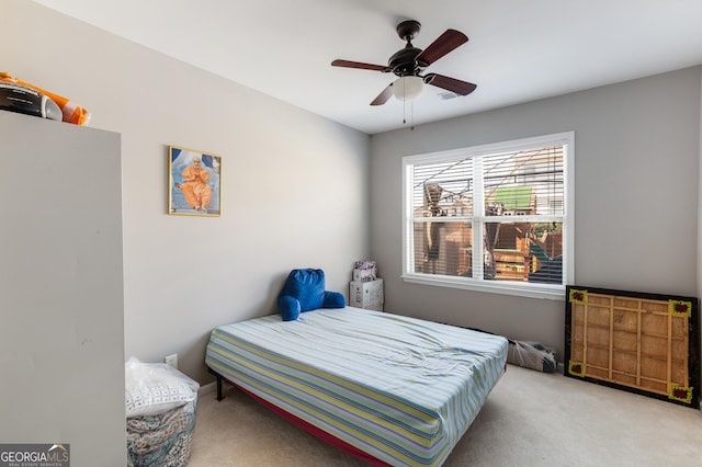 2430 Redbud Meadow Ln, Douglasville, GA 30135 - bedroom with carpet floors and a ceiling fan
