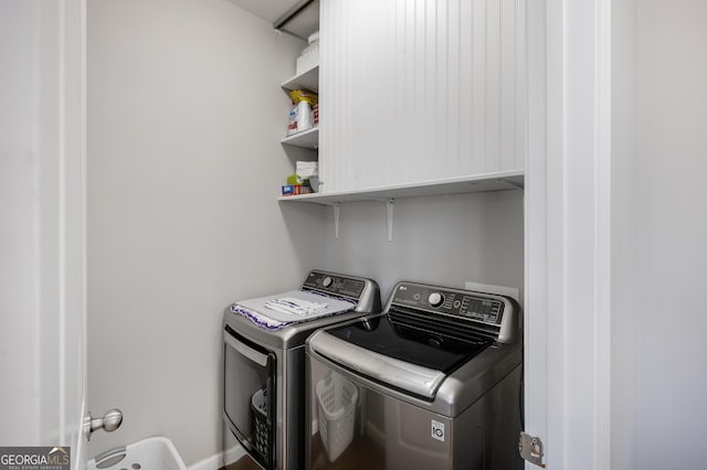 2430 Redbud Meadow Ln, Douglasville, GA 30135 - laundry room featuring separate washer and dryer