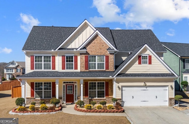 2430 Redbud Meadow Ln, Douglasville, GA 30135 - craftsman-style house with board and batten siding, driveway, and stone siding