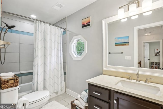 full bathroom with shower / tub combo, toilet, tile patterned flooring, vanity, and baseboards