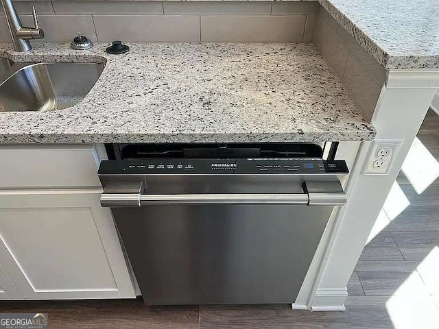1616 Avery Way, Tucker, GA 30084 - kitchen view of dishwasher, a sink, tasteful backsplash, and light stone countertops