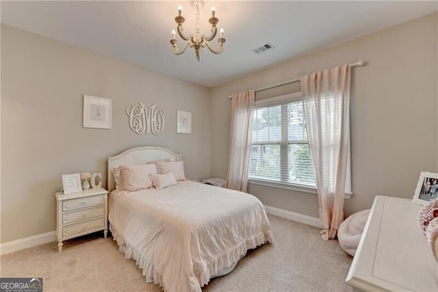 bedroom featuring a chandelier, light carpet, and baseboards