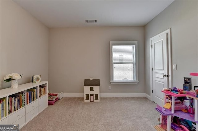 game room with carpet floors and baseboards