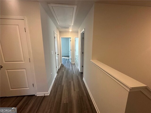 8668 Webb Rd Unit 6, Riverdale, GA 30274 - corridor with attic access, dark wood-type flooring, and baseboards