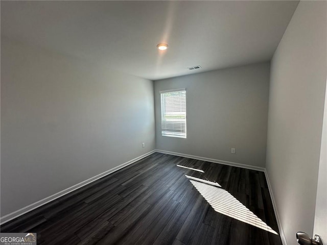 8668 Webb Rd Unit 6, Riverdale, GA 30274 - empty room with dark wood-style floors and baseboards