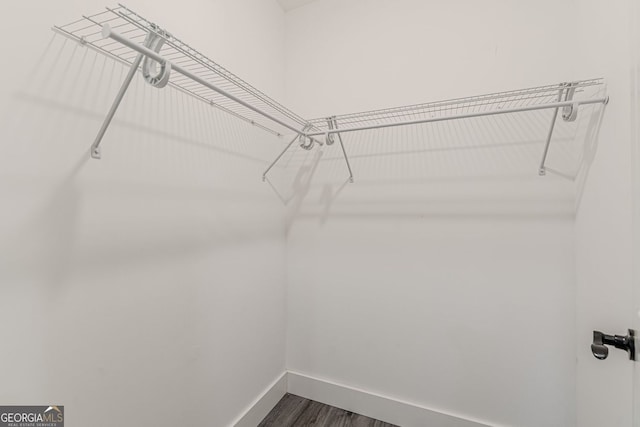 3275 Dodson Dr, East Point, GA 30344 - spacious closet featuring dark wood-type flooring