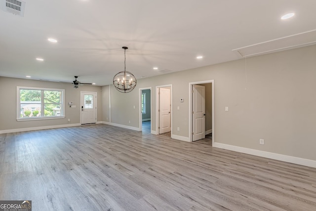 3275 Dodson Dr, East Point, GA 30344 - unfurnished living room with ceiling fan, recessed lighting, attic access, light wood-style flooring, and baseboards