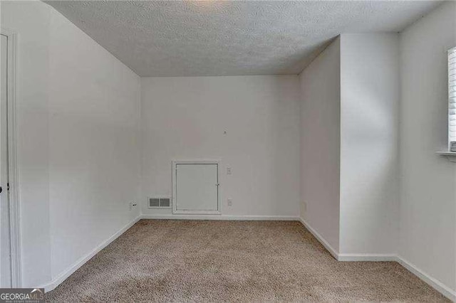 4278 Trotters Ln, Auburn, GA 30011 - unfurnished room with light colored carpet and a textured ceiling