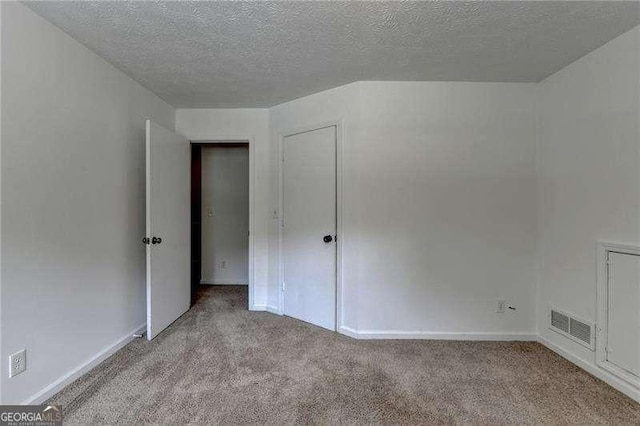 4278 Trotters Ln, Auburn, GA 30011 - unfurnished room featuring carpet floors and a textured ceiling
