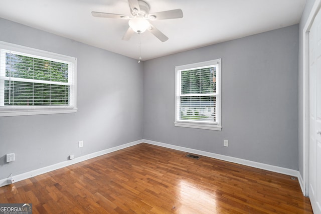 3650 Croft Pl NW, Atlanta, GA 30331 - spare room with plenty of natural light, wood finished floors, and baseboards