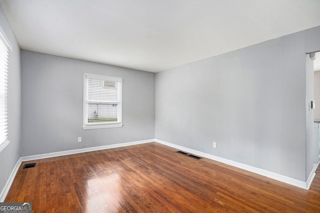 3650 Croft Pl NW, Atlanta, GA 30331 - unfurnished room with plenty of natural light, hardwood / wood-style floors, and baseboards