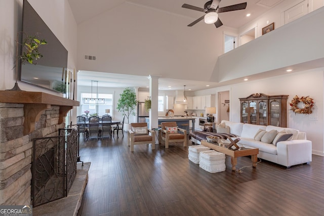 295 Graceton Farms Dr, Senoia, GA 30276 - living room featuring a high ceiling, ceiling fan, and dark wood-type flooring