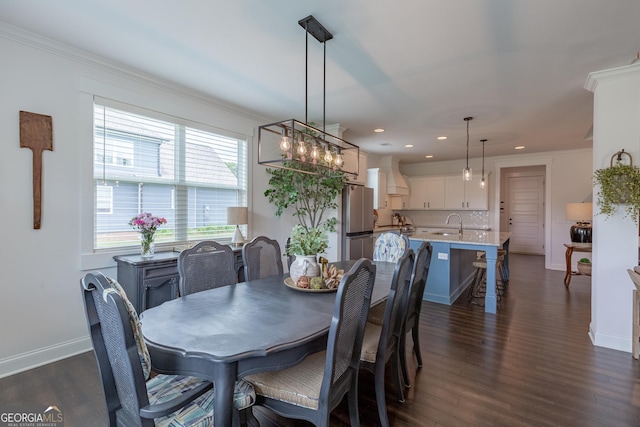 295 Graceton Farms Dr, Senoia, GA 30276 - dining room featuring dark wood-style flooring, recessed lighting, baseboards, and ornamental molding