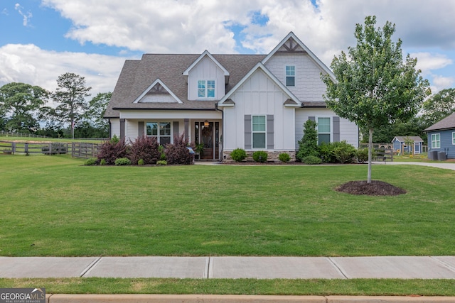 295 Graceton Farms Dr, Senoia, GA 30276 - craftsman-style home with board and batten siding, a shingled roof, and central AC